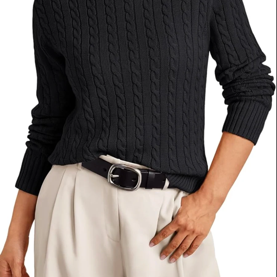 Reference photo of a charcoal cable-knit sweater worn with cream trousers